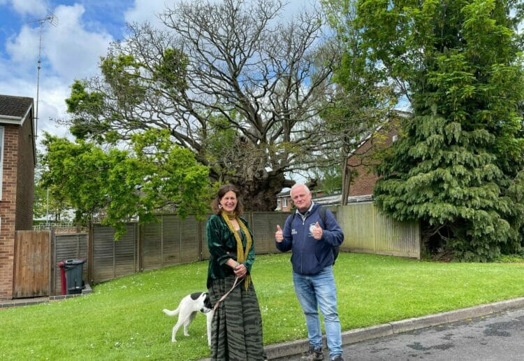 Rob McBride and Jennifer Leach and are trying to save The Kings Spy Oak in Gayhurst Close, Caversham. Picture: Local Democracy Reporting Service