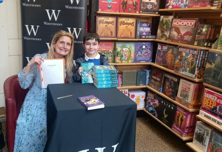 As well as signed copies, Cressida also sage advice to budding writers who shared some of their own work, including Leo, 9. Picture: Jake Clothier