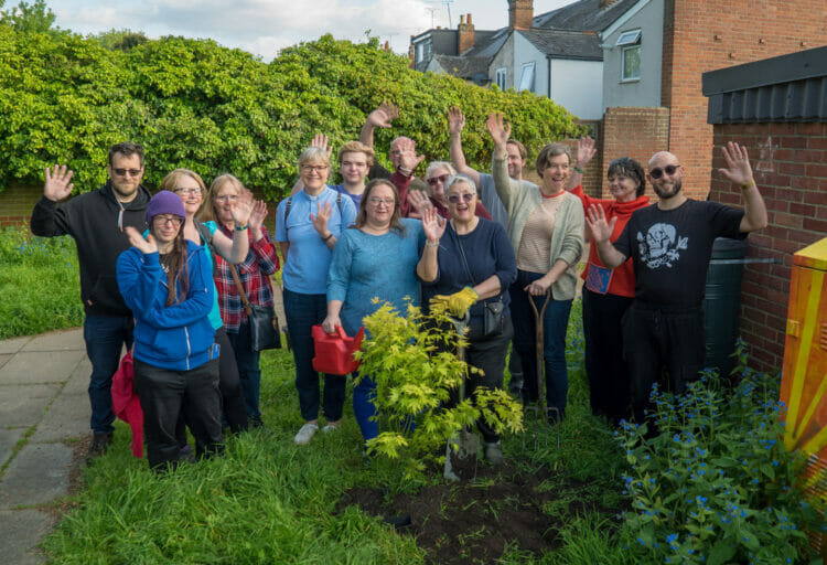 Newtown residents celebrate planting a king donated by Winnersh Garden Centres to celebrate the coronation of King Charles III