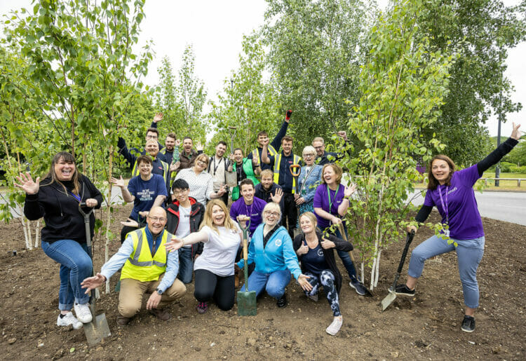 Some of the tree planting party from Thames Valley Park Picture: Stewart Turkington / www.stphotos.co.uk