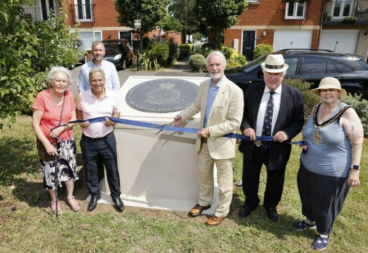 The ribbon cutting was overseen by, from left, resident Doreen Couzens, former Shinfield North councillor Parry Batth, marketing manager at David Wilson Southern Counties Phil Hurring, Angus Ross, ex-councillor and ex-RAF, former Air Commodore Rick Peacock-Edwards, and Wokingham mayor Cllr Beth Rowland. Picture: David Wilson Homes