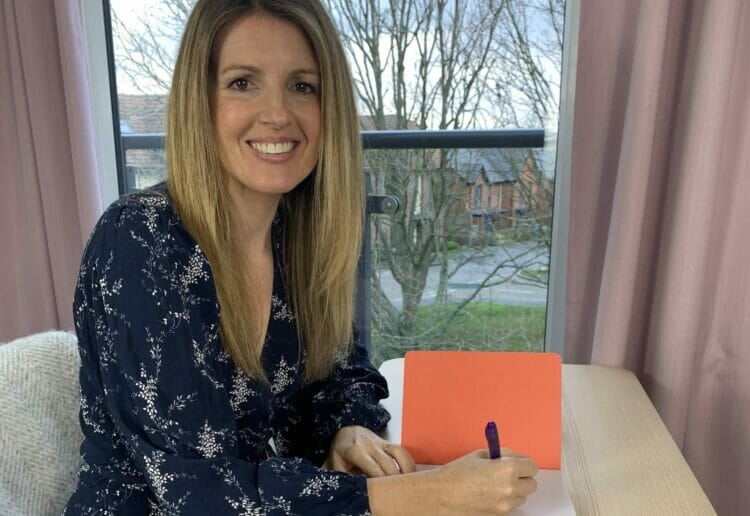 52 Lives founder Jaime Thurston, from Reading, has been awarded a BEM in the King's Birthday Honours list. She is pictured signing copies of her book The Kindness Journal, which helps provides funds for the charity Picture: 52 Lives