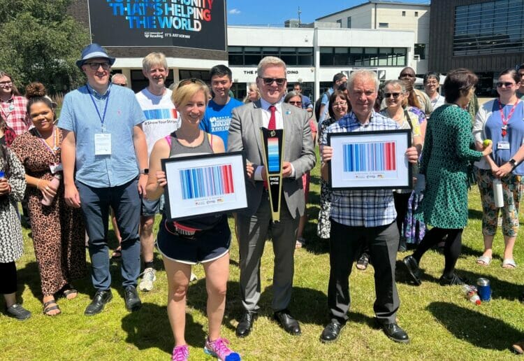 SHOW YOUR STRIPES: Cllr Sarah, executive member for climate emergency and residents services for Wokingham Borough Council (front left), Prof Robert Van de Noort, vice-chancellor of the University of Reading (middle), and Cllr John Ennis, lead councillor for climate strategy and transport for Reading Borough Council (front right), were present as the Running out of Time relay baton arrived at the University of Reading. Picture: Ji-Min Lee