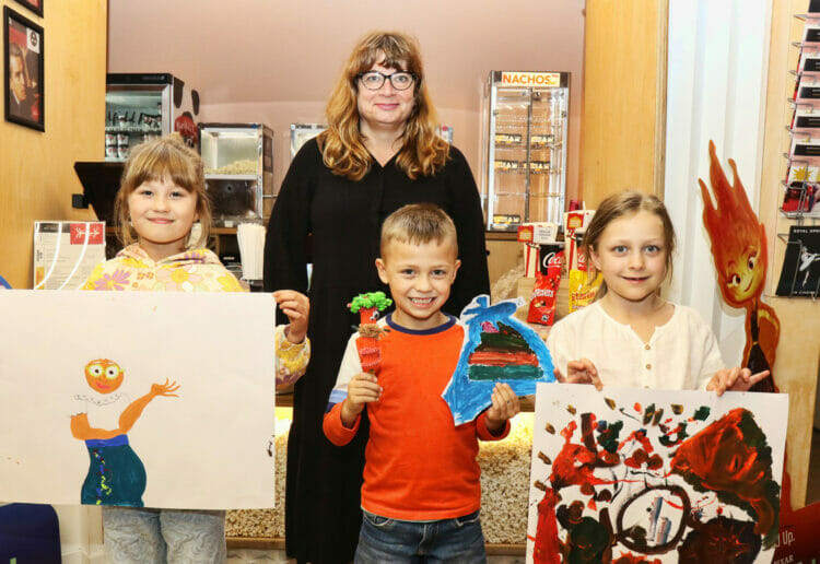 From left, Maisey, 8, Frank, 6, and Poppy, 7, with Caroline Streatfield, back, and their creations. Picture: Dijana Capan/DVision Images