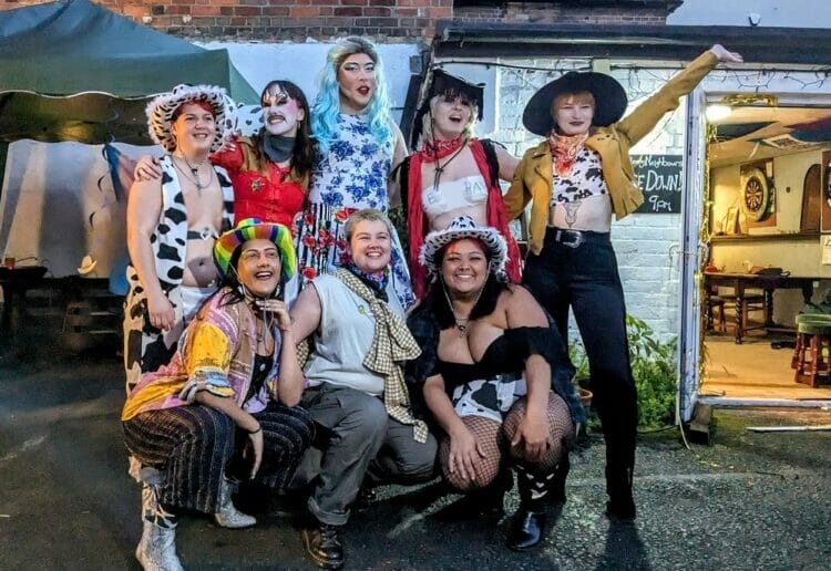 Members of the House of Big, including host Big Jay, left on Bottom row, and Kit, centre of bottom row, at the Rainbow Barn Dance. Picture: Jake Clothier