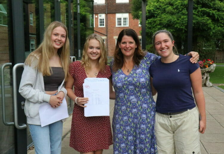 Tabitha Morgan, Amelia Shaw, and Catherine Cowper with Ms Hilary Jones, head of Upper 6 at Queen Anne's School. Picture: Courtesy of Queen Anne's School.