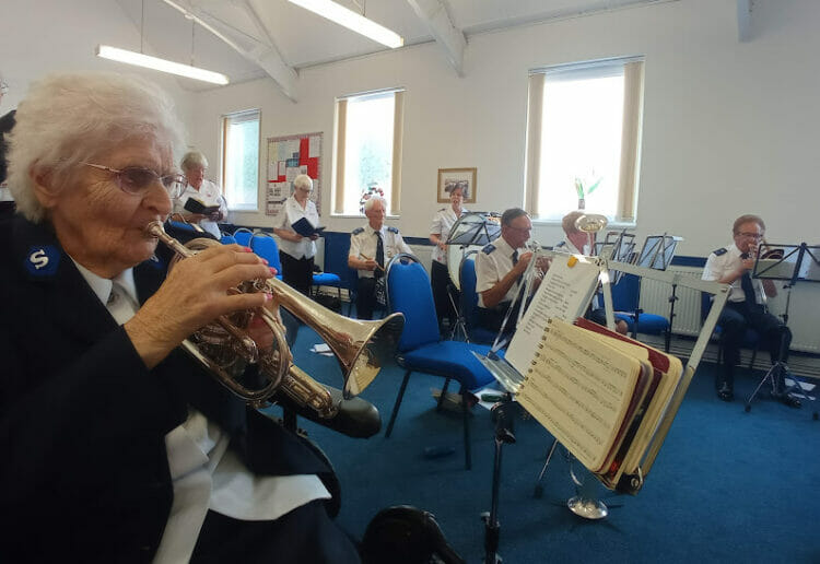 Valerie Handford is now a resident at Austen House care home in Lower Earley. They arranged for her to join the Salvation Army band at the Oxford Road citadel in Reading, playing the cornet during a service Pictures: Austen House
