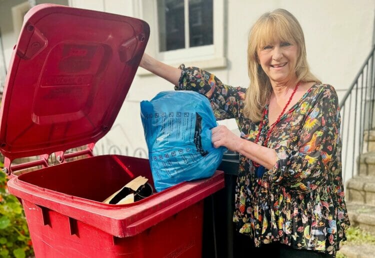 Reading Borough Council's Cllr Karen Rowland, celebrates the launch of a plastic bags and wrapping recycling trial Picture: re3