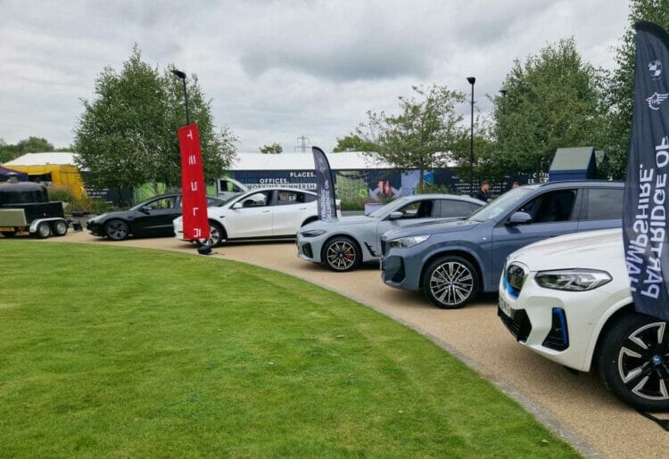 Tesla and BMW cars at the Electric Vehicle Open Day event on the green at Winnersh Triangle Picture: BD