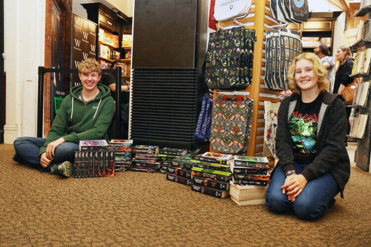First in the queue for the Derek Landy book signing at Waterstones Reading store were siblings Matthew and Emily from Charvil who had all their own copies of Derek Landy books signed by the author.  They had queued up since 8.30am - the signing started at 11am Picture: Dijana Capan/DVision Images