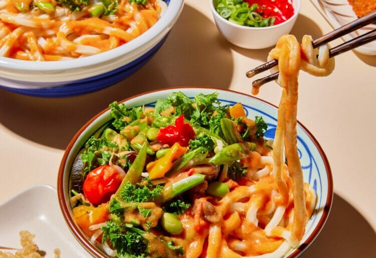 Veggie Yaki Udon has udon noodles with mixed vegetables in a rich miso sauce and is one of three new dishes on the menu at Marugame Udon