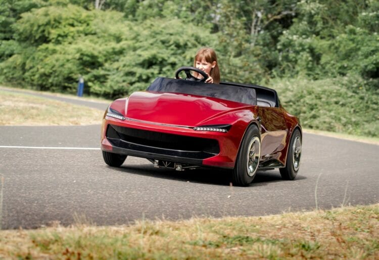 A youngster behind the wheel of the Firefly Sport from Young Driver