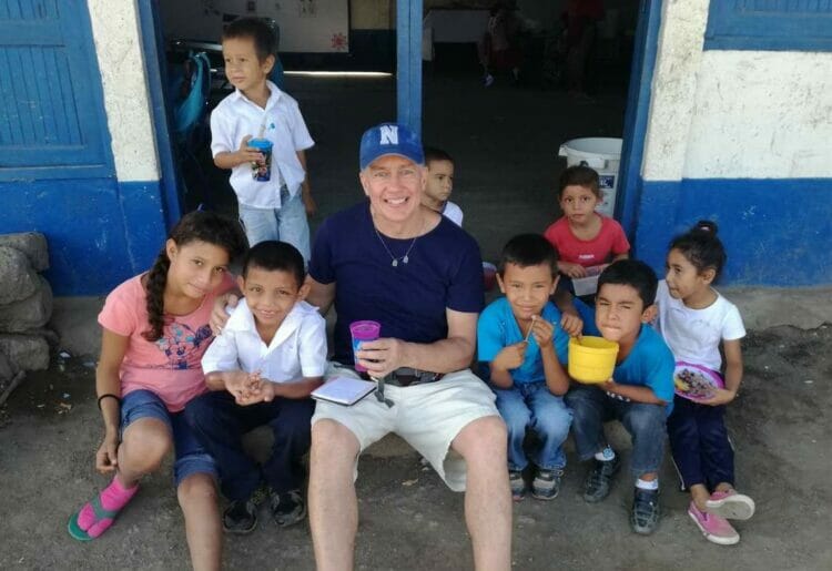Russell meeting some of the school kids that his school supplies will help during his recent trip. Pictures: Courtesy of Russell Maddicks via @LatAmTravelist