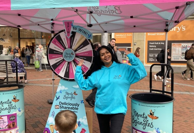 Angela is greeting queues of people trying their luck on the Monty Bojangles wheel of choccy treats. Picture: Emma Merchant