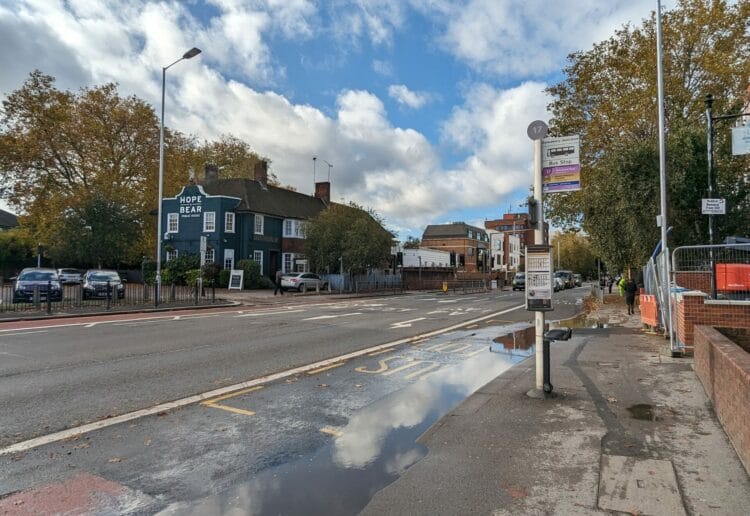 The eastbound bus lane on Kings Road (foreground) leading up to Cemetery Junction.