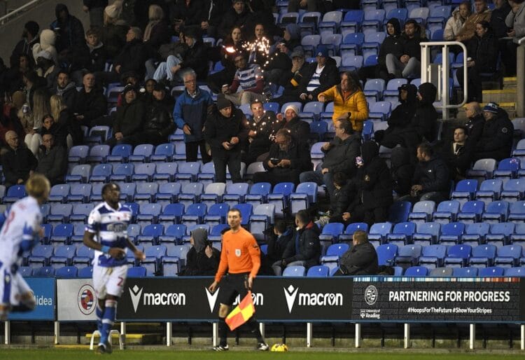 A flare being thrown from the top stands during the Reading FC V Bristol Rovers match on Tuesday, November 7 Picture: Luke Adams