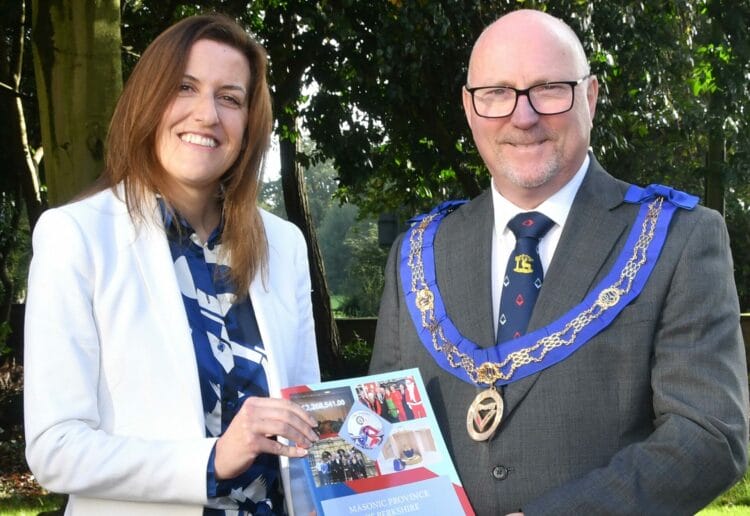 Alexandra Simpson, Chief Executive Officer of Berkshire Women?s Aid Charity with Gerry Preston, Assistant Provincial Grand Master of Berkshire Freemasons