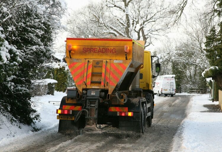A gritting lorry at work