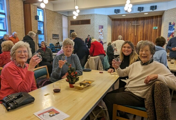 Attendees raise a glass to Christmas at the Reading branch's festive party. Picture: Jake Clothier