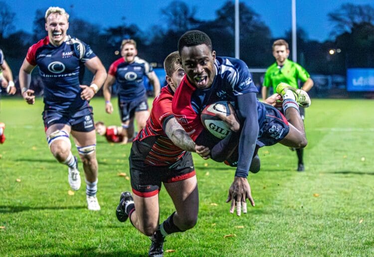 Ollie Monye dives over for the bonus-point try