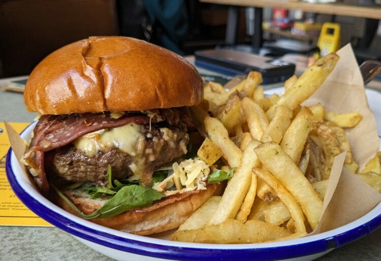 The Reading Burger, which features Berkshire-made cheeses in a Ploughman's lunch-style offering completely with tomateo and chilli chutney. Picture: Jake Clothier