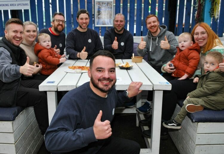 Glen Dinning (centre) with visitors and staff at the Very Street Food Christmas event. Picture: Steve Smyth.