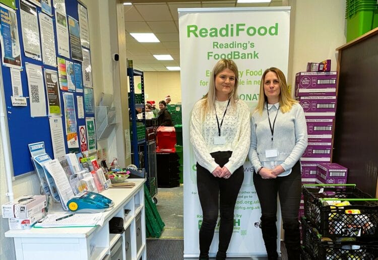 Alix Laflin (left), marketing manager for Vistry Thames Valley and Lycee Marsh (right), marketing assistant, delivering the food parcels to ReadiFood food bank