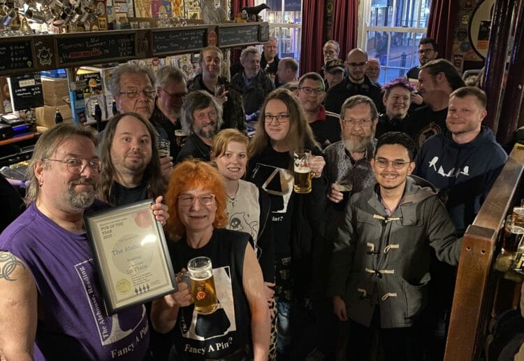 The staff of The Alehouse were joined by regulars to celebrate the pub of the year award Picture: Phil Creighton