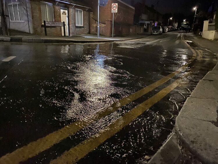 The water leak in Eastern Avenue at its junction with Wokingham Road Picture: Phil Creighton