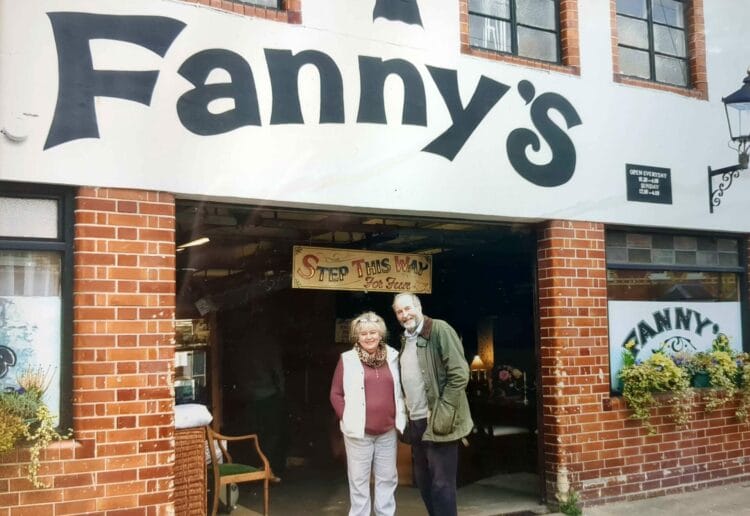 A family photograph of Julia and Will Lyons standing outside the shopfront. Picture: Jake Clothier