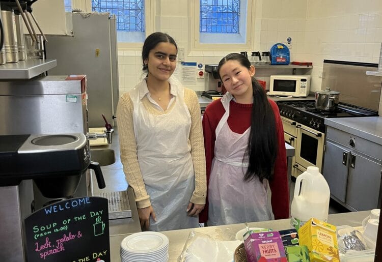 Students from Queen Anne's volunteering at the Caversham Baptist Church Welcome Warm Space. Picture: Queen Anne's School