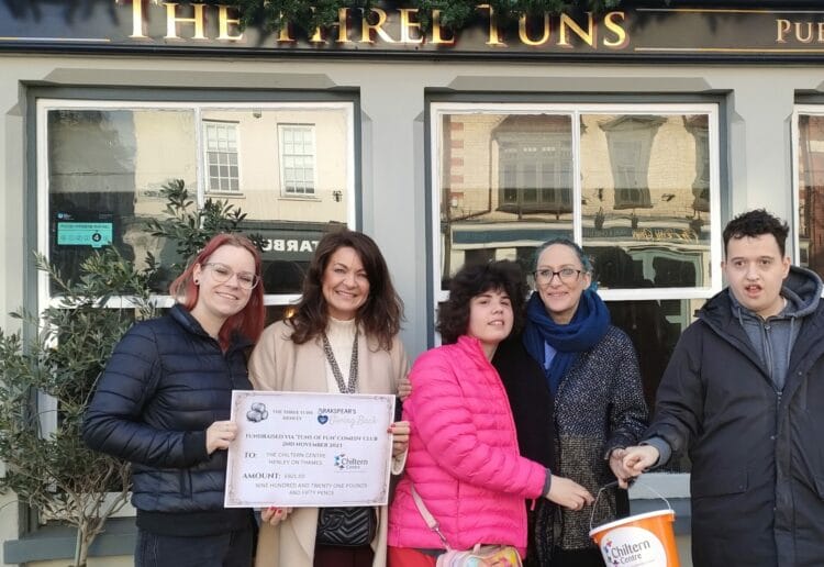 The Three Tuns general manager Michaela Durdisova (far left), The Chiltern Centre marketing manager Izzy Ansell (second from left) and carer Pippa Morton (second from right) with Sophie and Cameron, two young adults from the centre