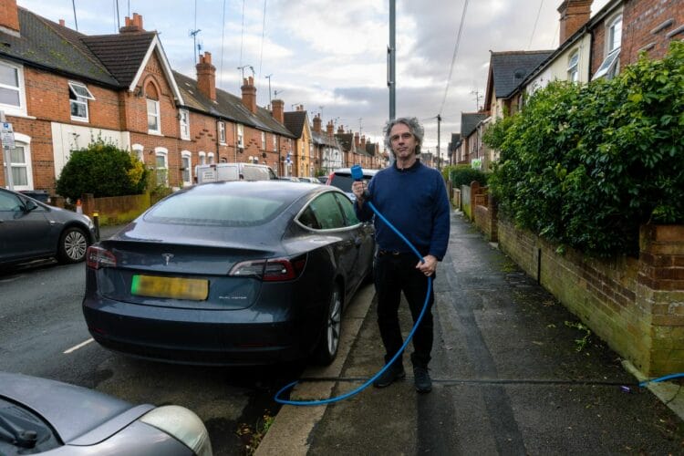 Reading resident Tim Liddle using a Kerbo Charge cable for his Tesla. Picture: Kerbo Charge