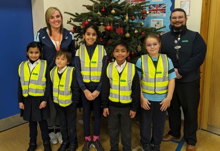 Radstock Primary school pupils with  Assistant headteacher, Jessica Kinch & Specsavers' Ricky Mattioni