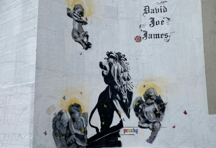 A memorial art piece dedicated to David Wails, Joe Ritchie-Bennett, and James Furlong, by anonymous artist Peachy, has been returned to its former glory on Reading Bridge. Picture: Phil Creighton