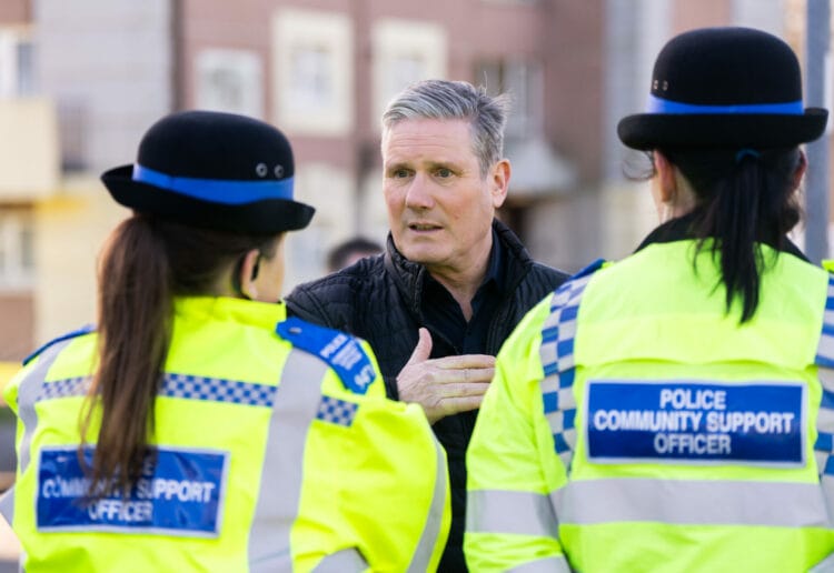 Keir Starmer, leader of the Labour Party, speaks to local police officers during a visit to an area affected by anti social behaviour in Tilehurst. Picture: Labour Party