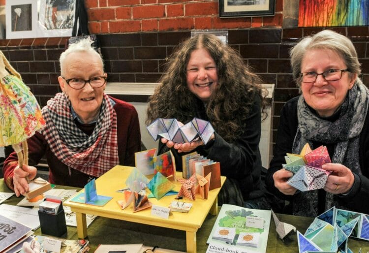 Love Unites Art Exhibition at St. Lukes Church Hall. Helen Westhrop, Neile Wright and Rachel Knight with their artwork. Picture: Steve Smyth