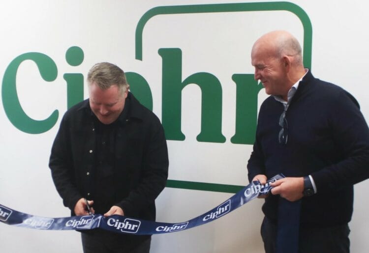 Jason Davenport, CEO of the Chartered Institute of Payroll Professionals, cutting the ribbon with Sion Lewis, CEO of Ciphr at the official opening of Ciphr?s Reading office on Monday, March 4.