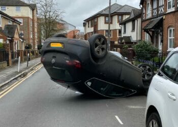 Police close road in east Reading due to overturned car