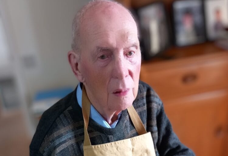 Derek, a Reading Bluebird Care customer, celebrates winning a golden ticket