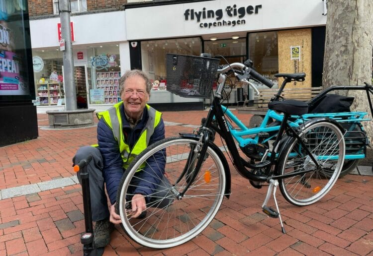 Andy Von Glehn repairing a bike at the Dr Bike sessions outside Sainsburys in Broad Street, Reading Picture: Local democracy reporting service