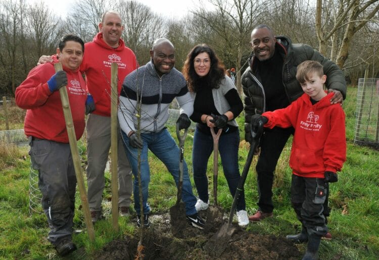 Whitley Orchard Tree Planting on Saturday. Actor Winston Ellis (right) joined volunteers and Freely Fruity members planting trees. Picture: Steve Smyth