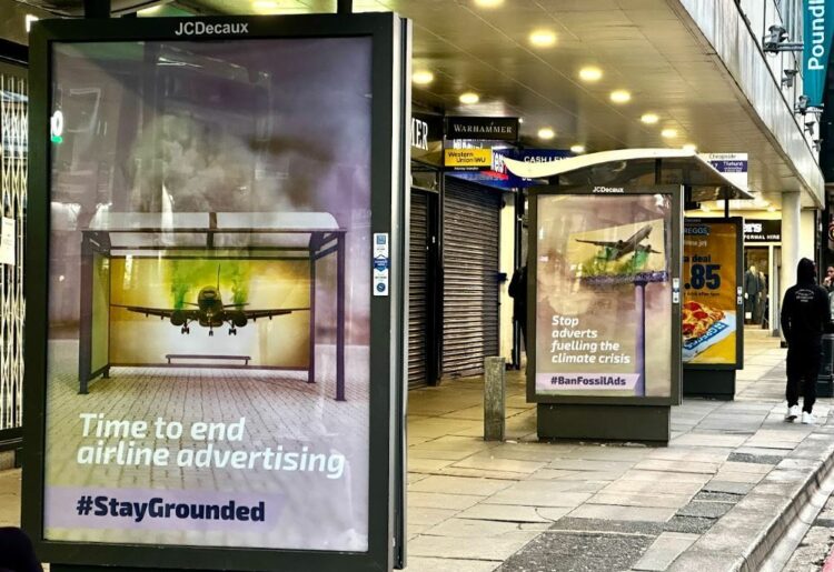 A hijacked bus advert in Reading calling for an end to advertising that is promoting our self destruction, with the hashtag #StayGrounded Picture: Brandalism network