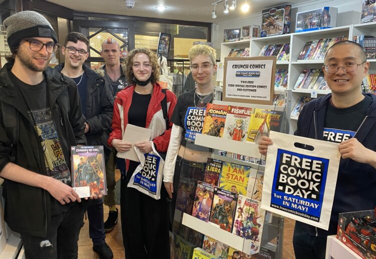 Customers with the Crunch Comics team celebrating Free Comic Book Day 2023 at its Harris Arcade store in Reading Picture: Phil Creighton