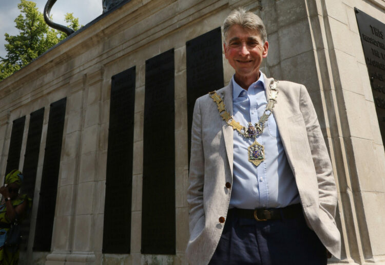 Mayor of Reading Cllr Tony Page in the shadow of the newly-refurbished Maiwand Lion in Forbury Gardens. Picture: Dijana Capan at DVisionImages