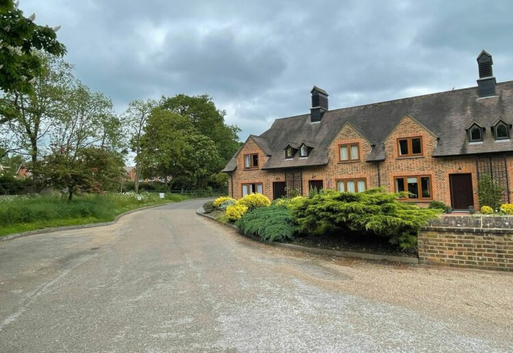 The widest point at Lyefield Court, Emmer Green. Neighbours argue that it is too narrow for construction traffic and other vehicles to pass. There is also no designated footpath Picture: Local Democracy Reporting Service