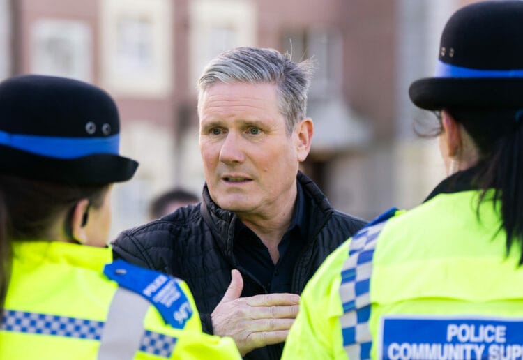 Keir Starmer, leader of the Labour Party, speaks to local police officers during a visit to an area affected by anti social behaviour in Tilehurst. Picture: Labour Party