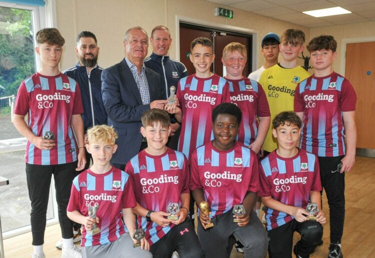 Mick Gooding with the team he sponsors, the Under 13s Vipers.