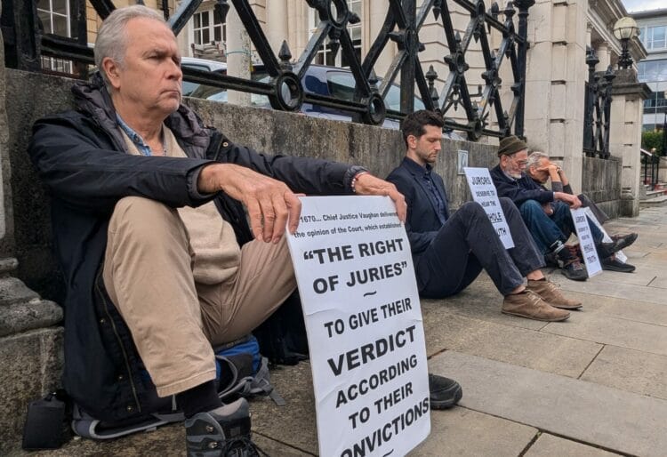 Defend Our Juries activists have once again staged action outside Reading Crown Court following further arrests of activists publicising the rights of jurors last week. Picture: Jake Clothier