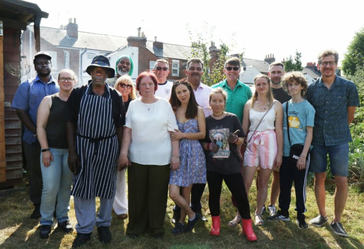 Councillor David Stevens and Councillor Mohammed Ayub with some of the allotment plot holders at George Street.